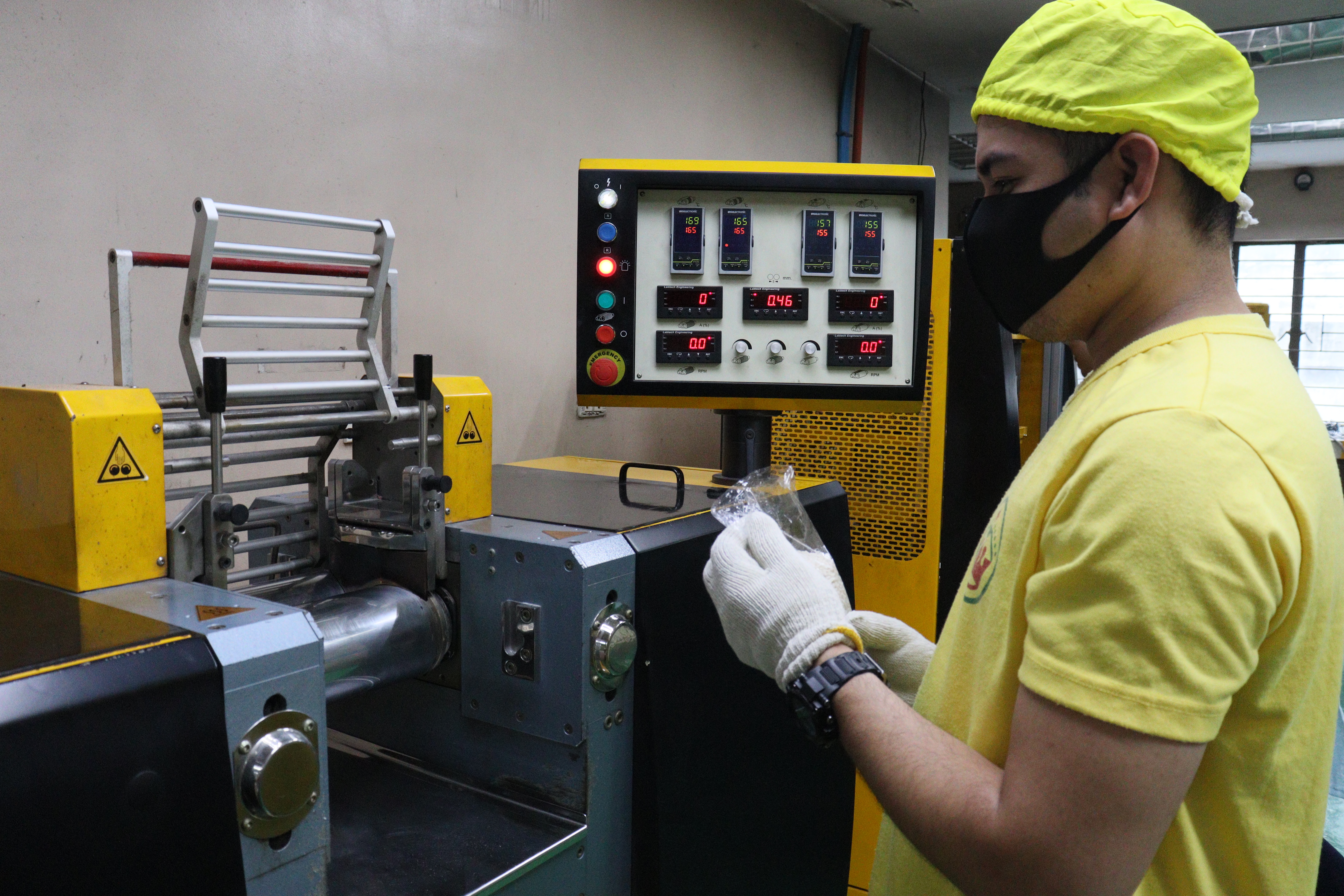CROWN quality control operator at compounding machine